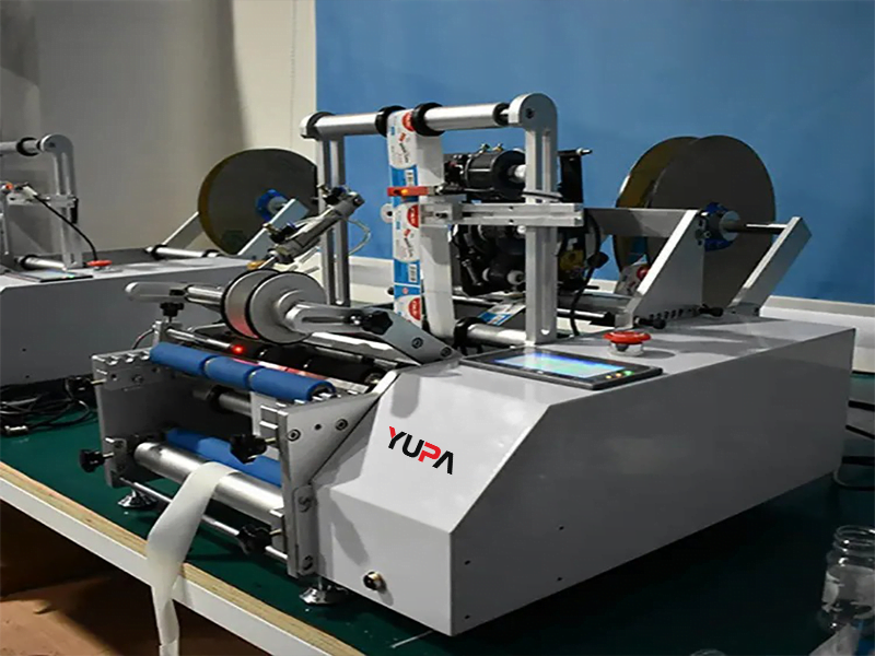 Máy dán tem nhãn chai tròn bán tự động
