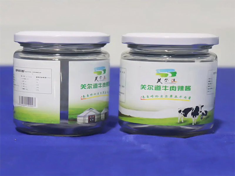 Ứng dụng Máy dán tem nhãn chai tròn tự động